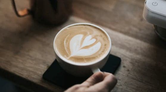 delicious coffee with a heart shape in the foam