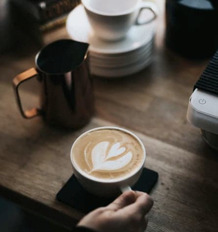 delicious coffee with a heart shape in the foam